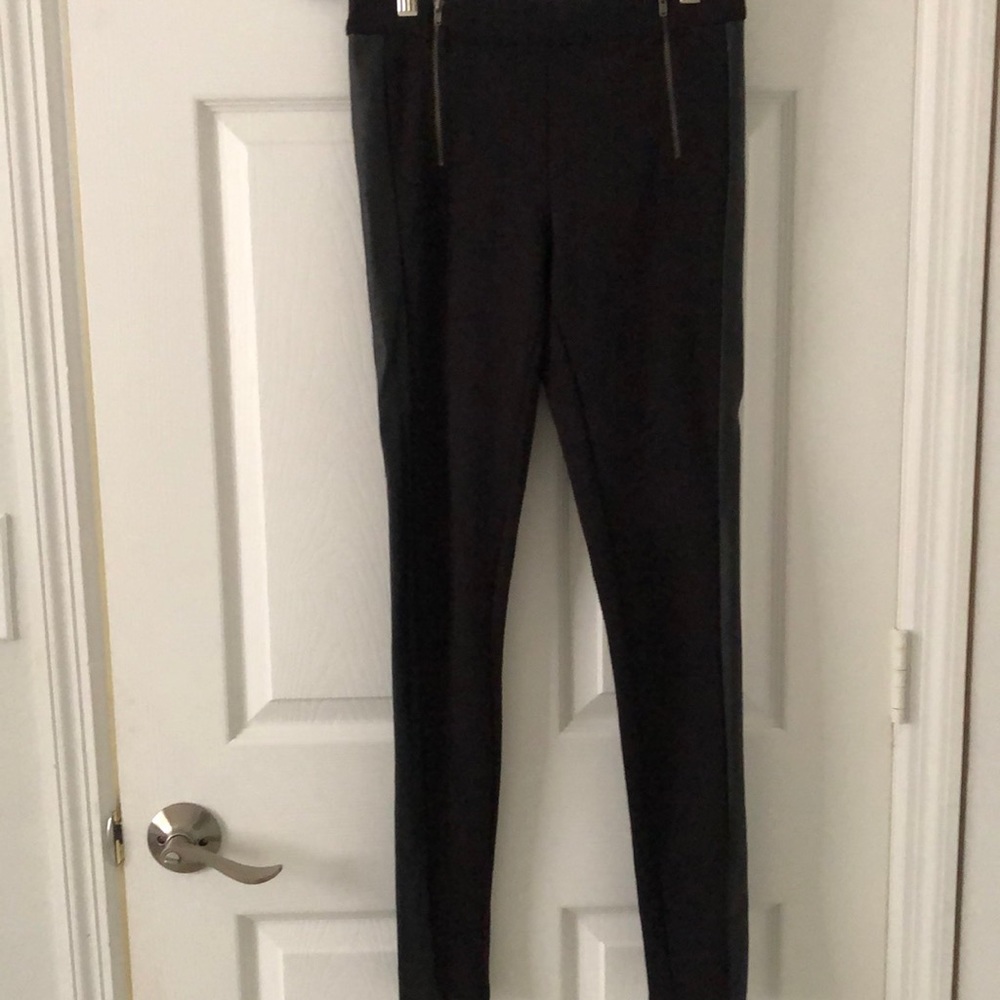 Black leggings with zippers and faux black leather